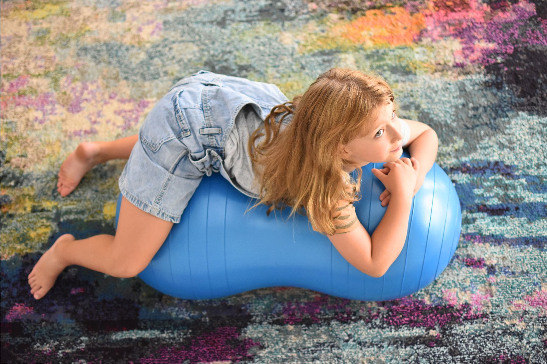Blue Peanut Balance Ball for kids and adults, promotes fitness and fun at home.