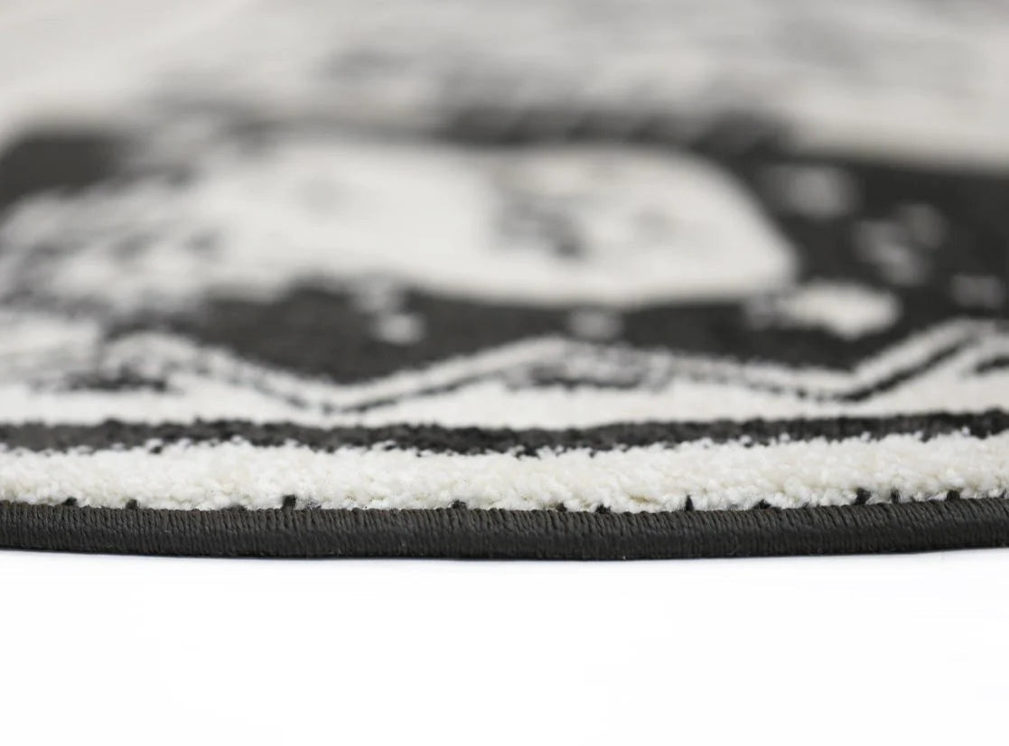 Petit Camping Adventures Kid Rug in black and white, ideal for playful home decor.