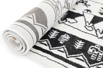 Petit Camping Adventures rug, black and white kid-friendly design for an imaginative home decor.