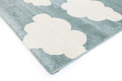 Kids rug in aqua and white with whimsical clouds design, perfect for playrooms or bedrooms.