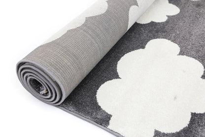 Petit Clouds dark grey and white kid rug, soft and playful addition to childrens bedroom.