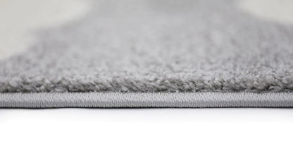 Soft grey and white kids rug with cloud design, perfect for cozy play areas.