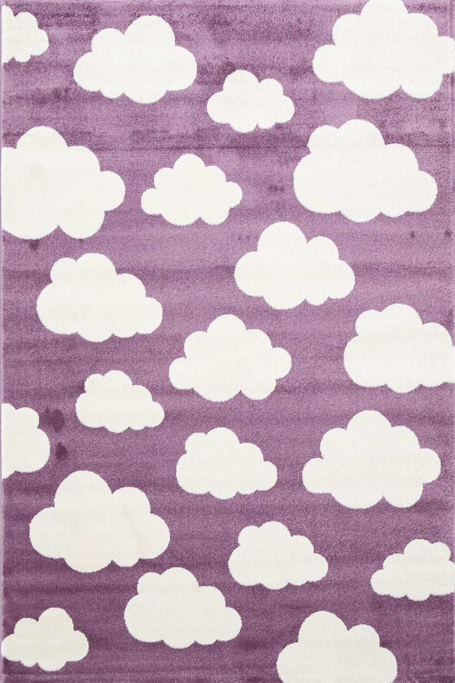 Kid rug with soft pink and white clouds design for charming childrens room decor.