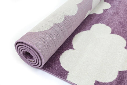 Petit Clouds Pink and White Kid Rug, perfect for adding a whimsical touch to childrens rooms.