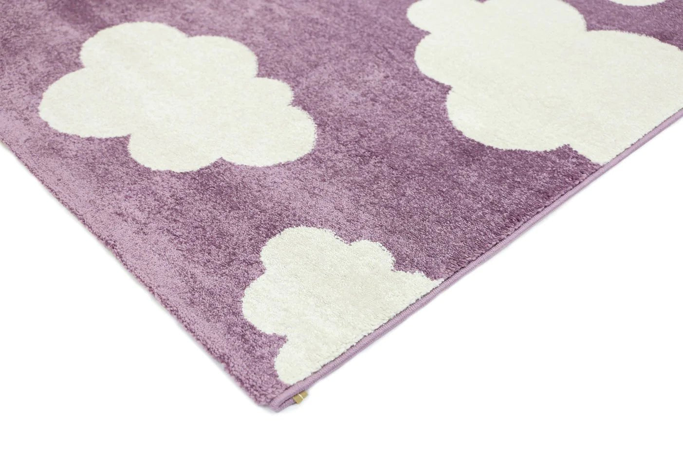 Pink and white cloud-shaped kid rug for cozy and playful childrens room decor.