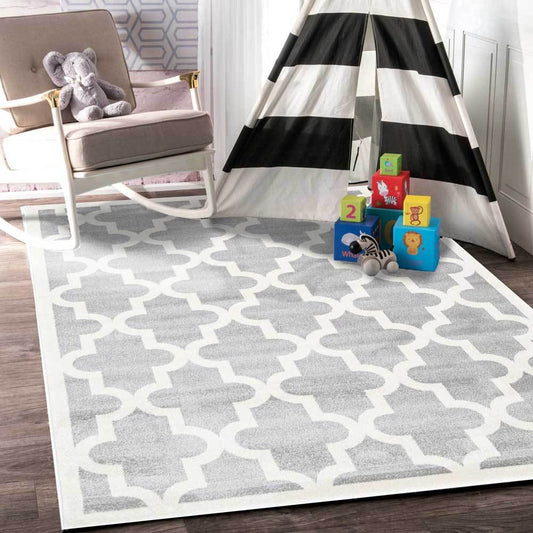 Petit Piccolo light grey and white lattice kids rug for cozy, playful room decor.