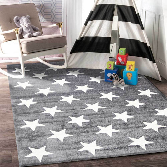 Petit Piccolo Stars Charcoal and White Kids Rug | Soft, playful rug for childrens bedroom decor.