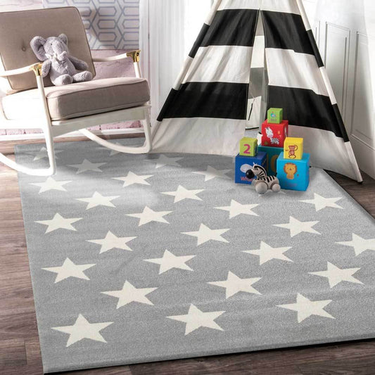 Kids rug with charming petit stars design in light grey and white colors.