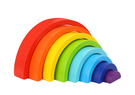 Colorful rainbow stacker toy for childrens educational playtime at home. Fine motor skills development.