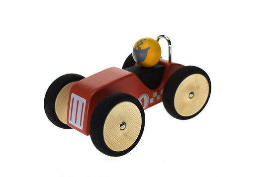 Red retro large racing car toy for kids, ideal for imaginative play at home.