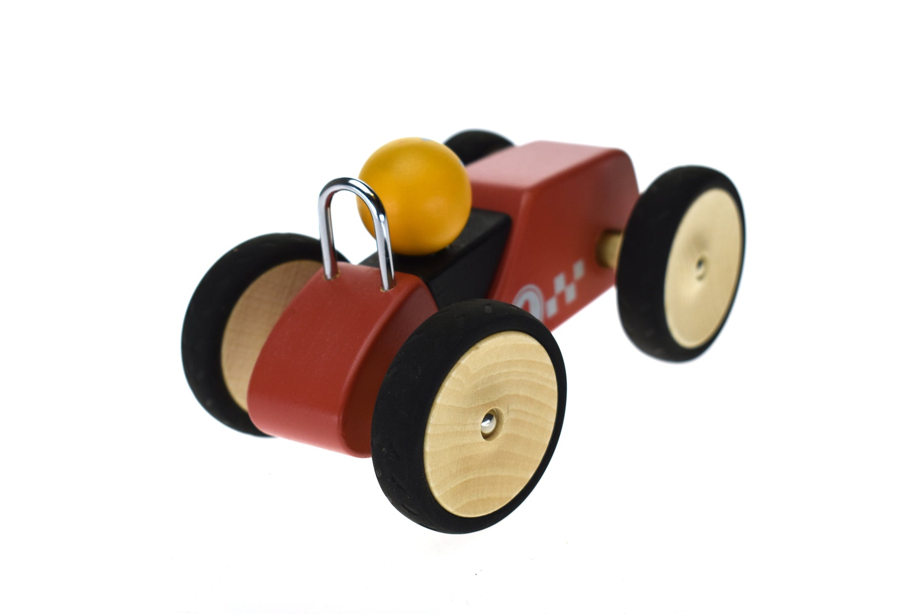 Red retro large racing car toy for childrens play at home.