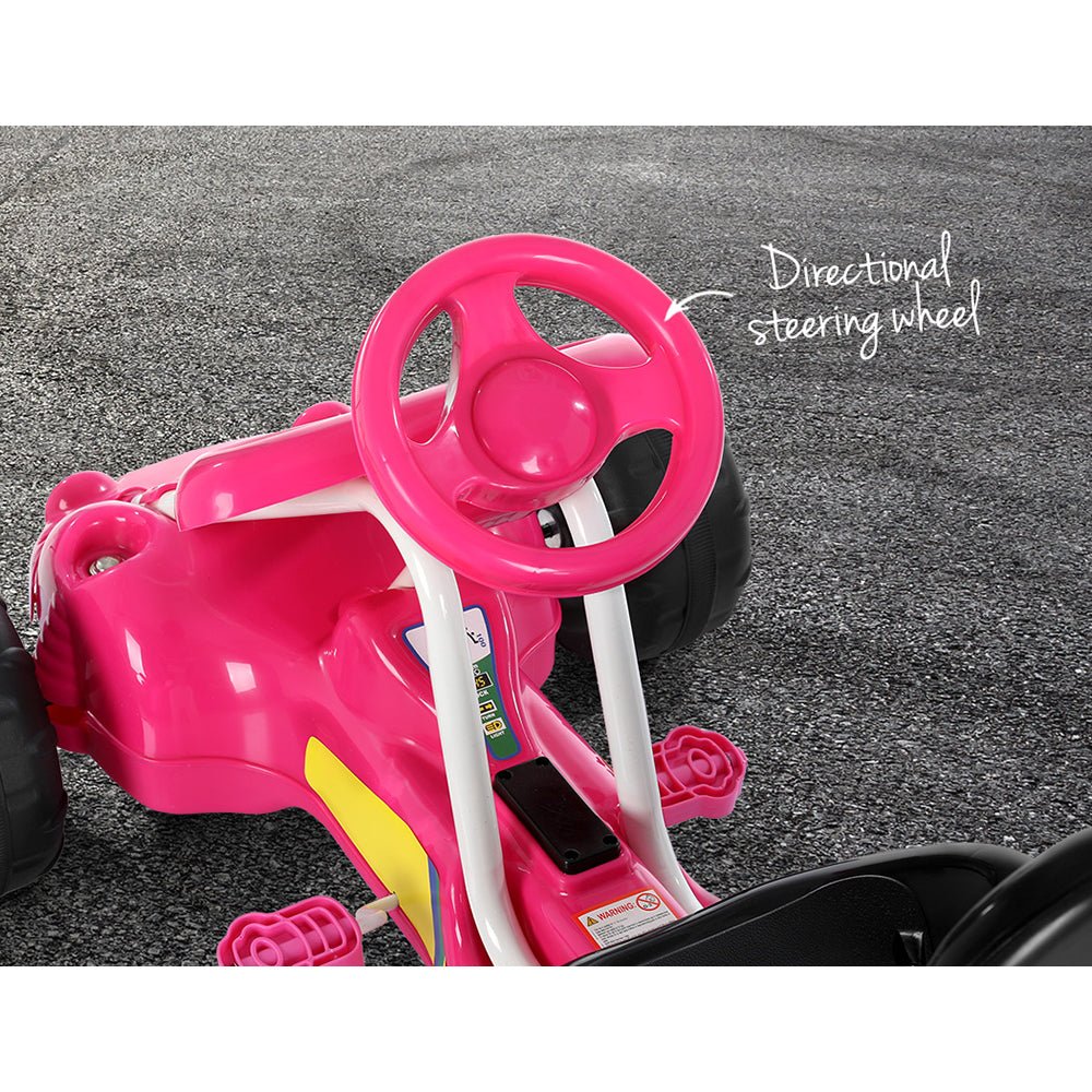 Pink pedal-powered go-kart with plastic tires for thrilling home playtime.