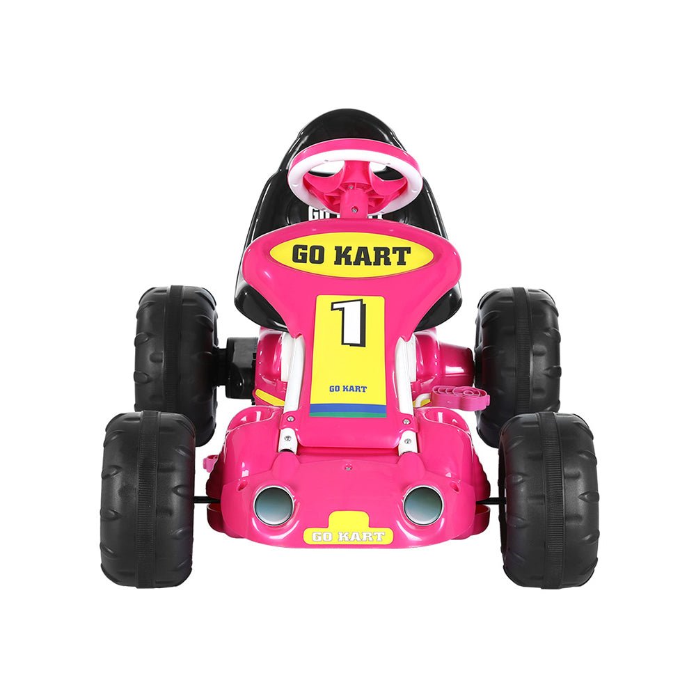 Pink kids racing go kart with plastic tires, pedal-powered for fun indoor/outdoor play.