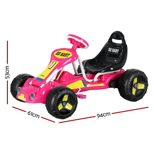 Kids pink pedal go kart with plastic tires for fun home racing adventures