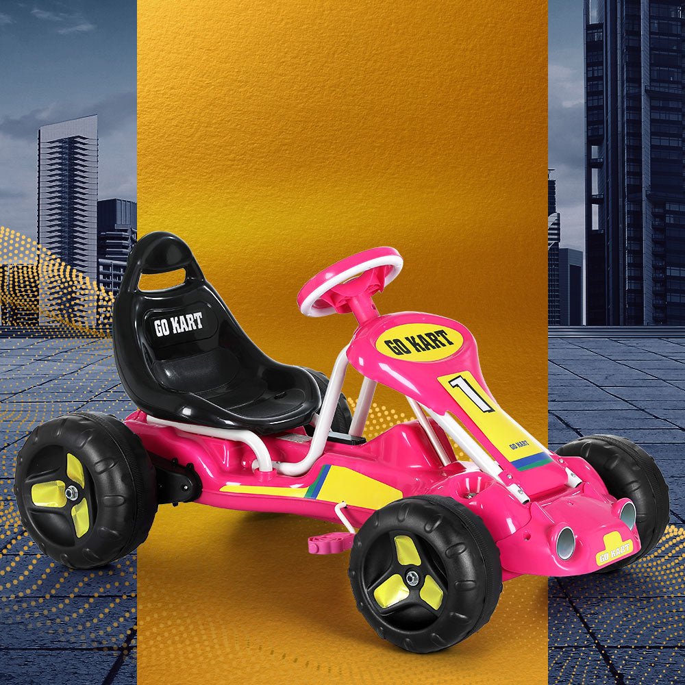 Pink pedal go kart with plastic tires for kids home racing fun.