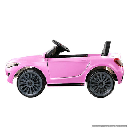 Pink 12v ride-on car modeled after Maserati, ideal for kids imaginative play at home.