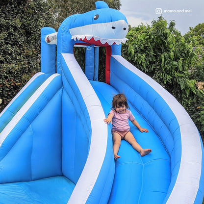 Inflatable Sharky Water Slide and Splash play equipment for kids, perfect for summer fun at home.