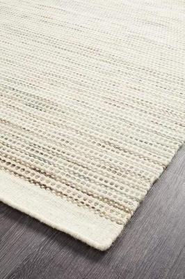 Relax in style with our Skandinavian-designed 310 Natural Floor Rug, perfect for any room.