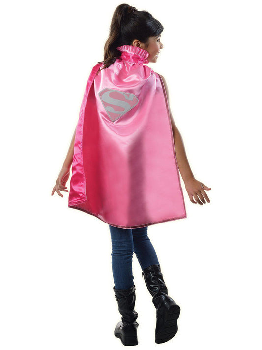 Kids pink Supergirl cape with glitter trim, ideal for imaginative play at home.