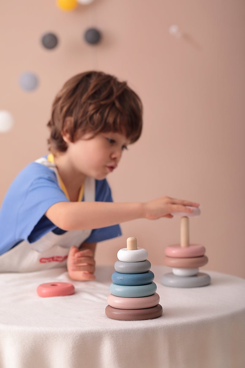 Colorful stacking tower for children, promotes calm play and motor skills development at home