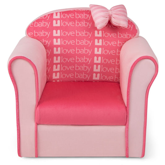 Pink velvet toddler couch with bow, designed ergonomically for kids comfort at home.