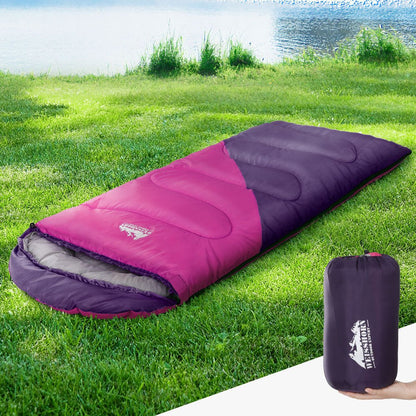 Pink kids sleeping bag (172cm) for camping and hiking, equipped with thermal insulation for warmth.