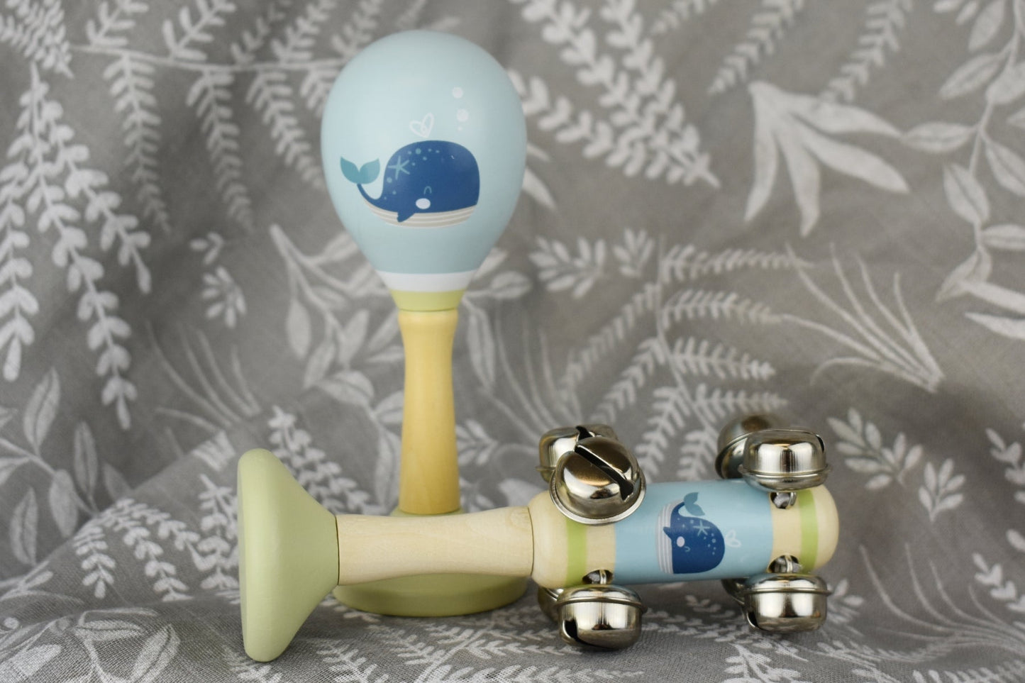 Whale wooden maraca and bell stick set for kids musical play and learning at home.