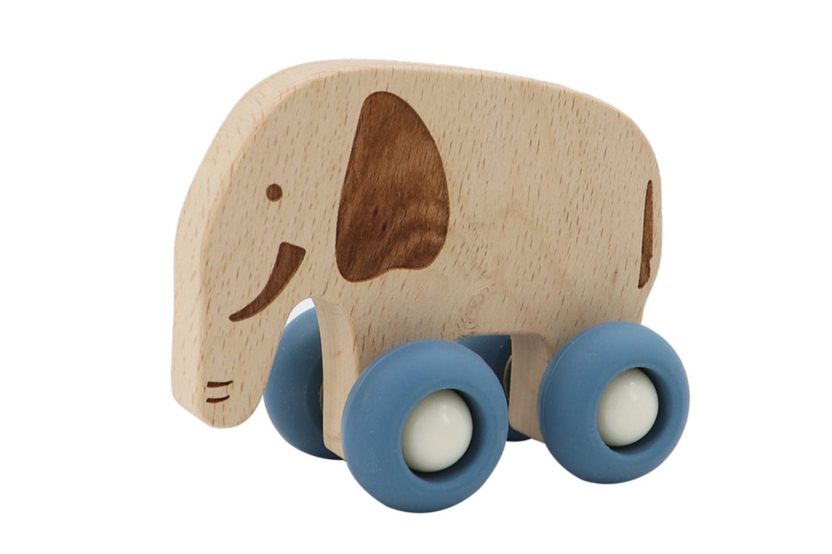 Wooden elephant toy with silicone wheels, perfect for safe and playful home fun.