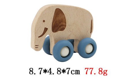 Wooden elephant toy with durable silicone wheels for interactive play and imaginative fun.