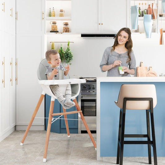 Baby Sitting in Grey High Chair