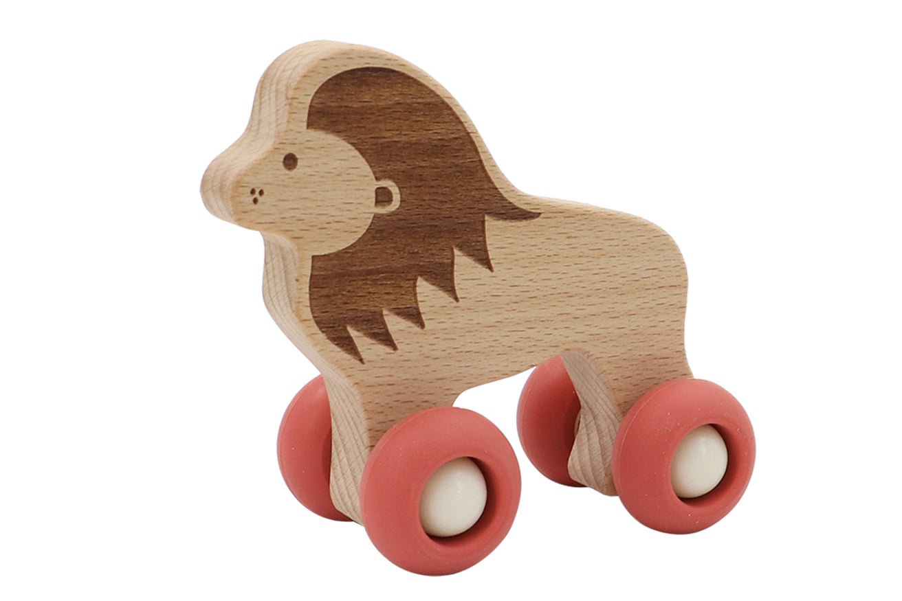 Wooden lion toy with durable silicone wheels, perfect for interactive play and imaginative fun.