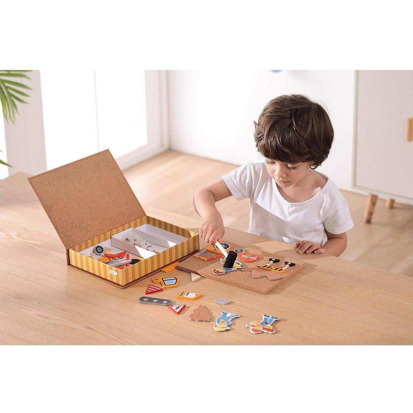 Wooden toy construction truck set, promotes shape recognition, storable in bookcase.