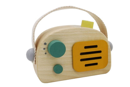 Wooden toy radio music box in vintage green transistor style, perfect for childrens imaginative play.