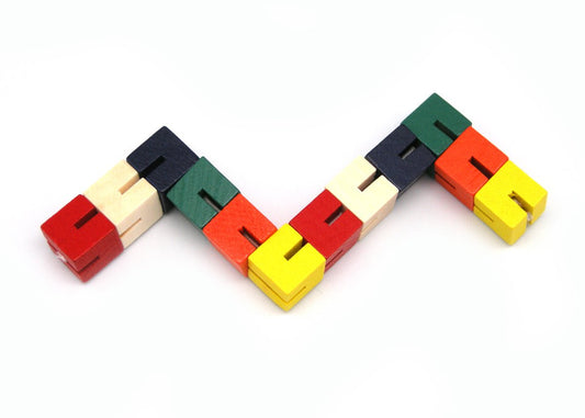 Colorful wooden twist and lock blocks for interactive and educational play at home.