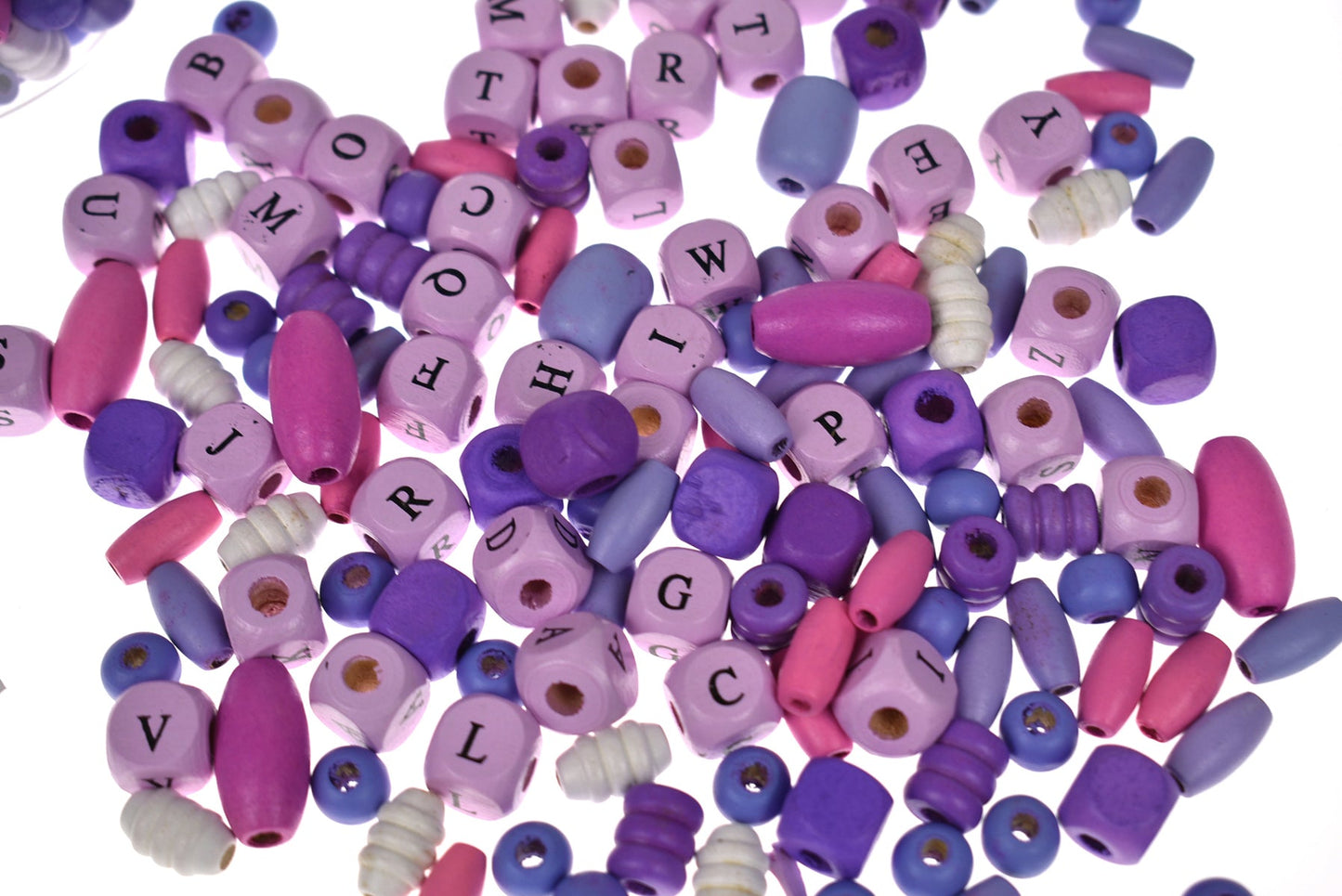 Colorful alphabet bead crafting kit for kids with purple theme, ideal for jewelry making at home.